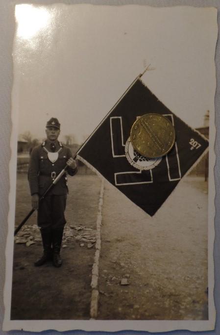 RAD postcard picture with flag and gorget.